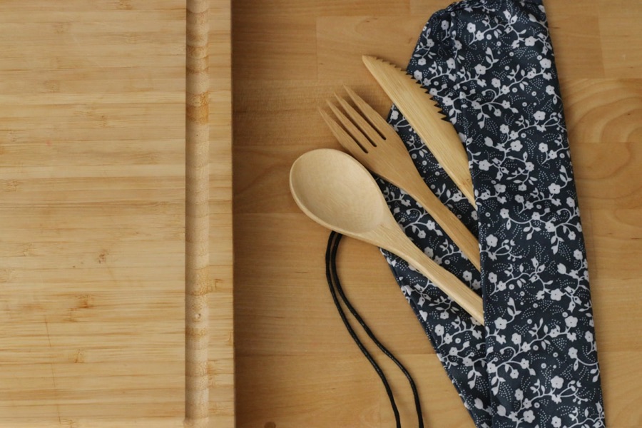 Bamboo bar tools arranged on a serving board