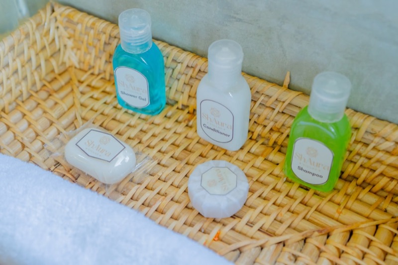 Bamboo amenity tray on a neutral background